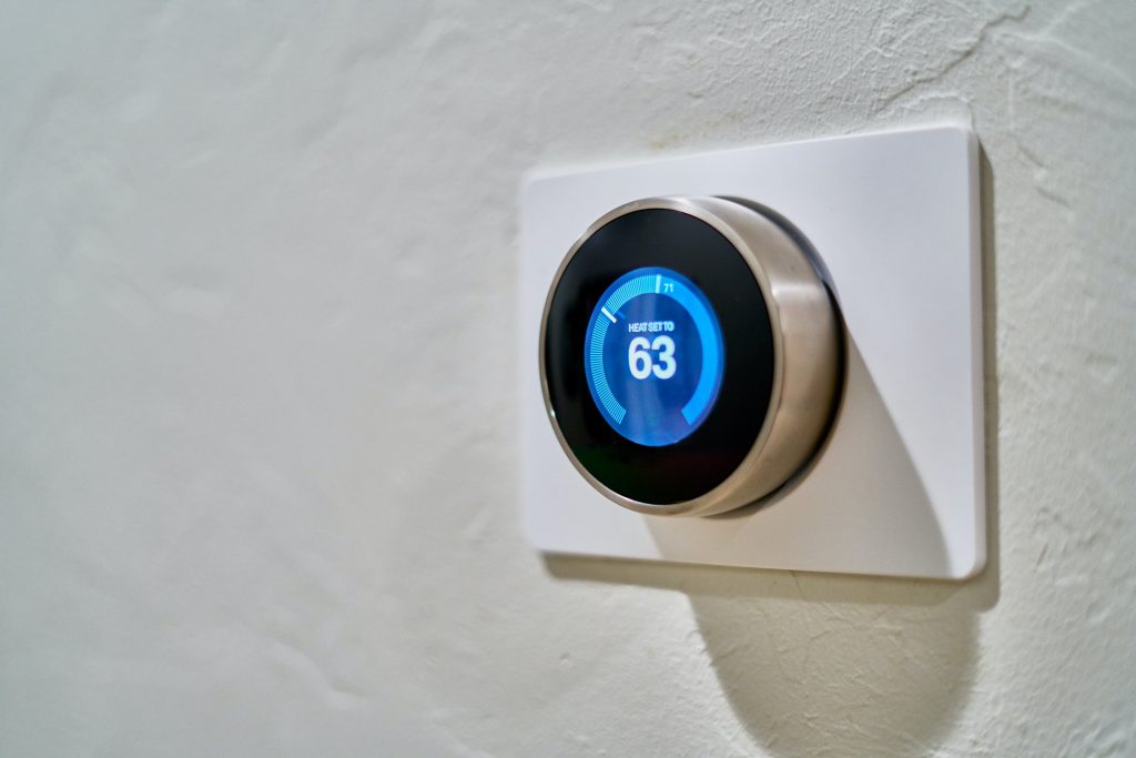 thermostat on wall - furnace maintenance - Birdfuels